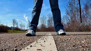man with jeans and sport shoes