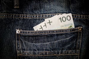 jeans pocket with money bills