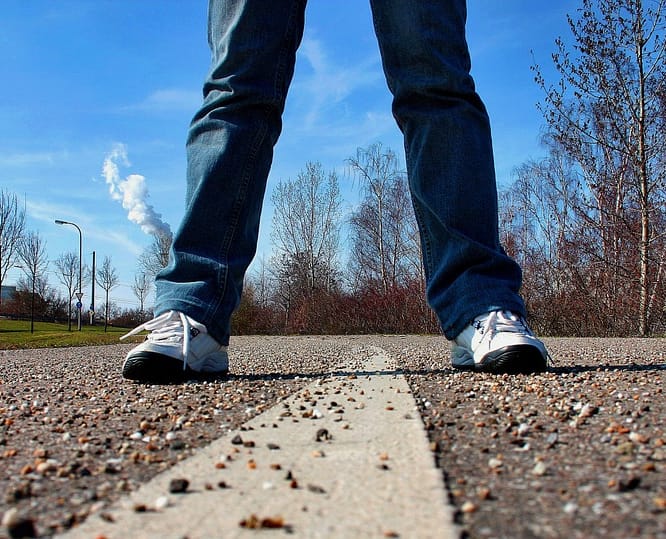 man with jeans and sport shoes